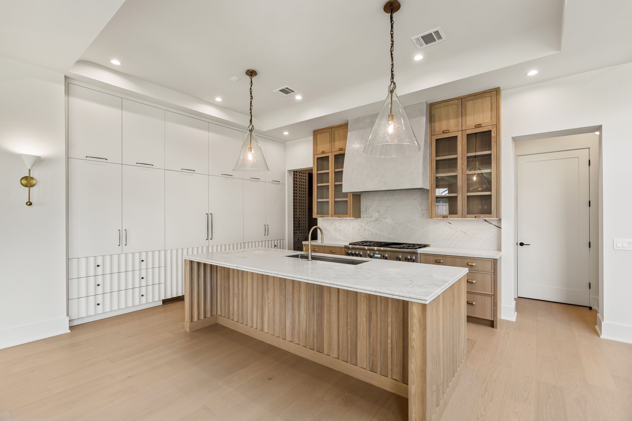 1616 Hazard Street Houston, TX 77019 - Photo 16 of 50 a kitchen with stainless steel appliances granite countertop a stove and a refrigerator