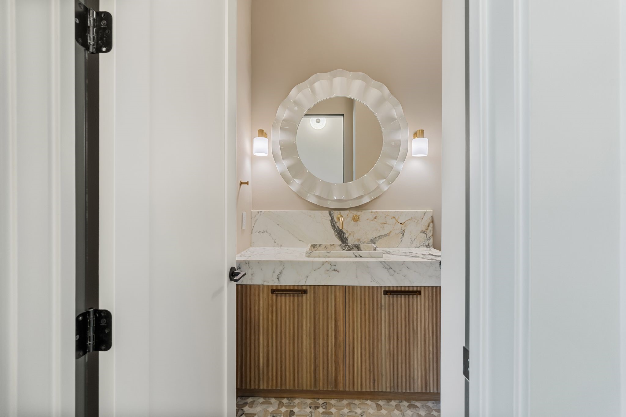 1616 Hazard Street Houston, TX 77019 - Photo 24 of 50 a bathroom with a granite countertop sink and a mirror