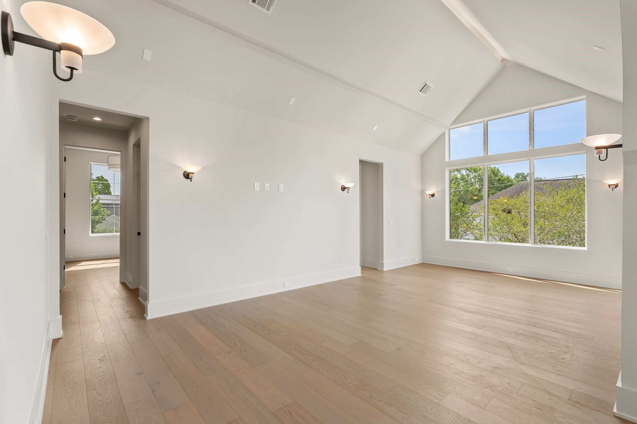 1616 Hazard Street Houston, TX 77019 - Photo 29 of 50 wooden floor in an empty room with a window