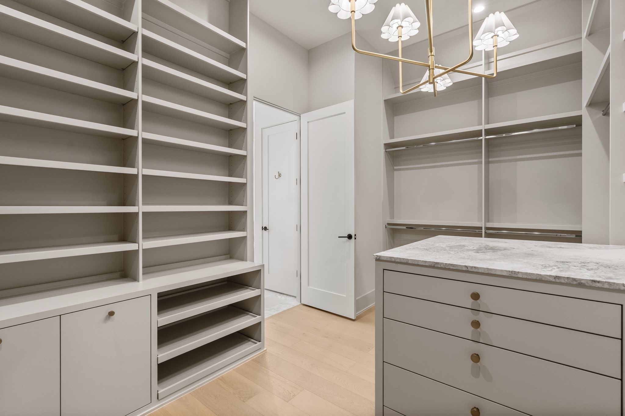 1616 Hazard Street Houston, TX 77019 - Photo 36 of 50 a room with cabinets and a wooden floors