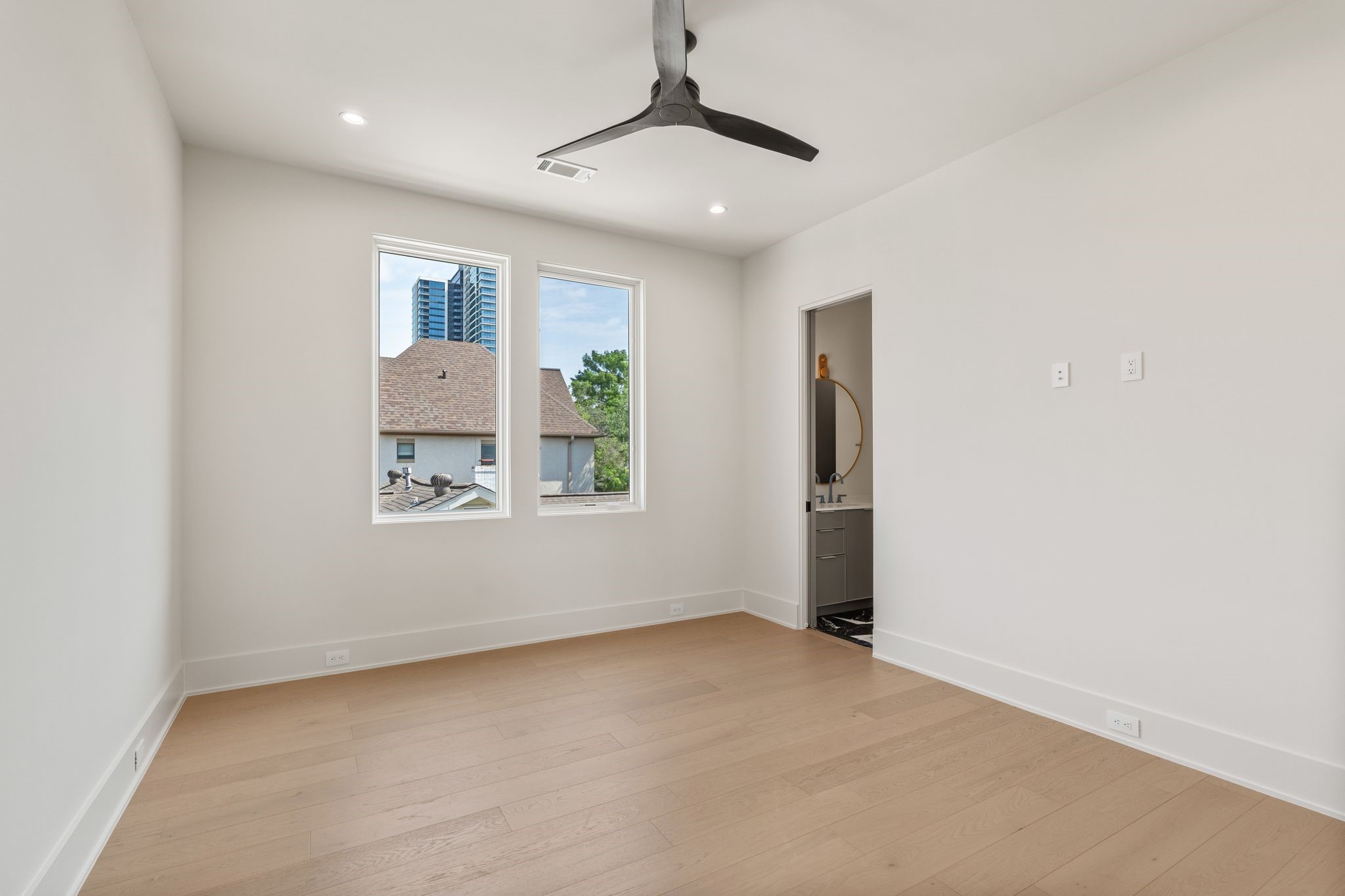 1616 Hazard Street Houston, TX 77019 - Photo 39 of 50 a view of an empty room with a window