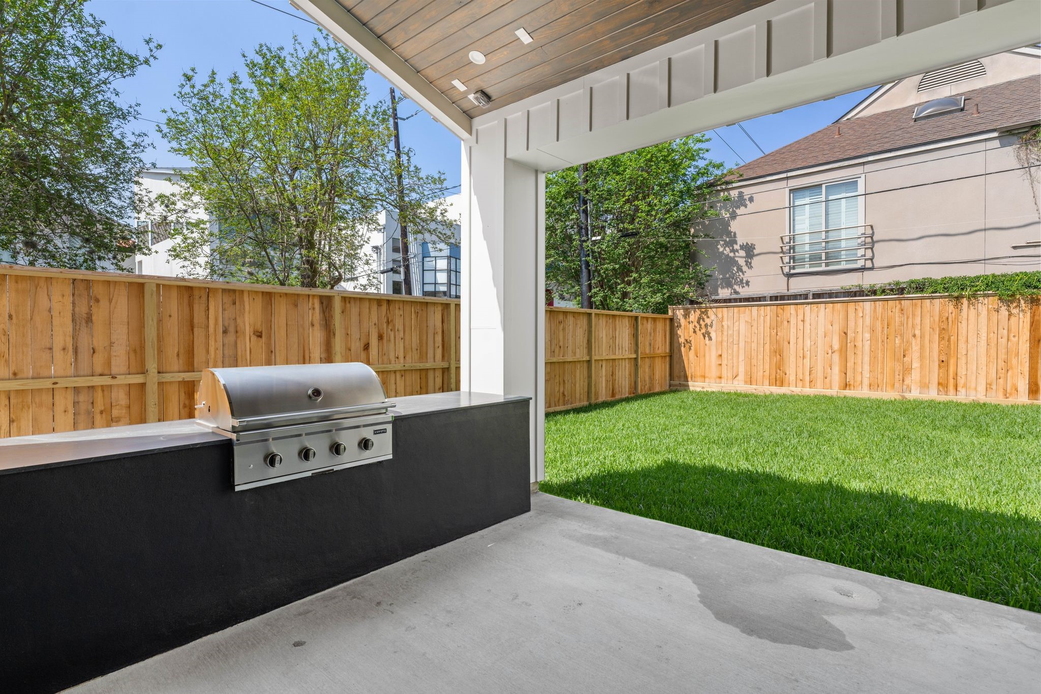 1616 Hazard Street Houston, TX 77019 - Photo 45 of 50 Covered patio with built-in grill and wood paneled, vaulted ceiling. Imagine dining al fresco overlooking your backyard.