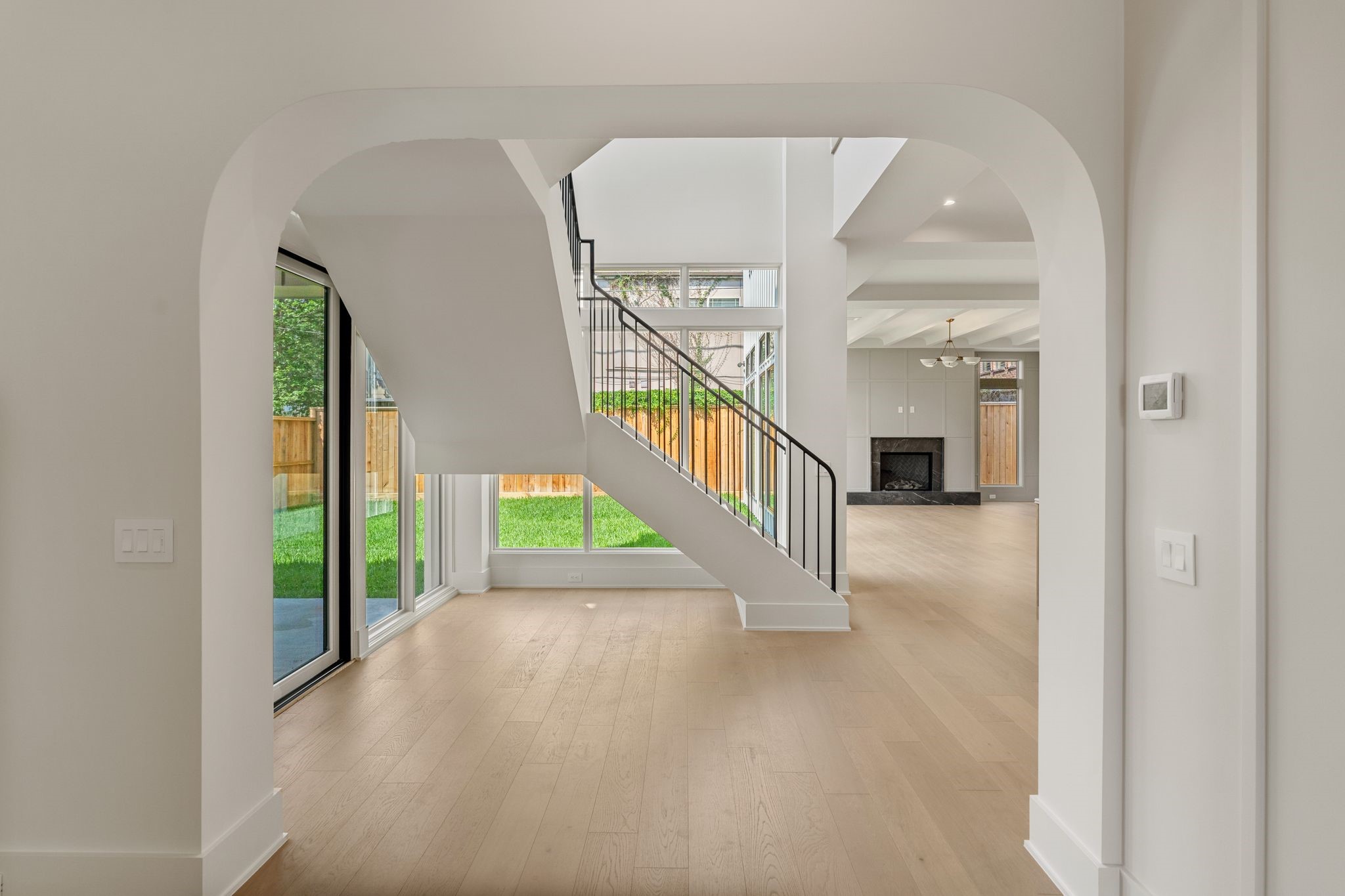 1616 Hazard Street Houston, TX 77019 - Photo 5 of 50 Elegant floating staircase and walls of Pella windows.