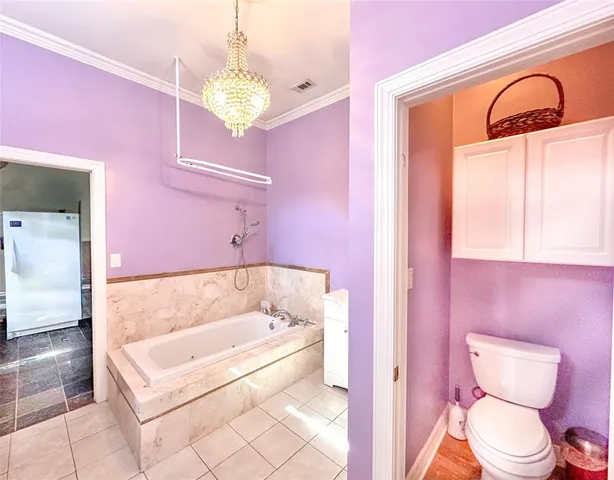 a bathroom with a sink a bathtub and a toilet