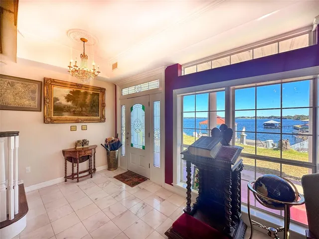 a view of a livingroom with furniture and a window