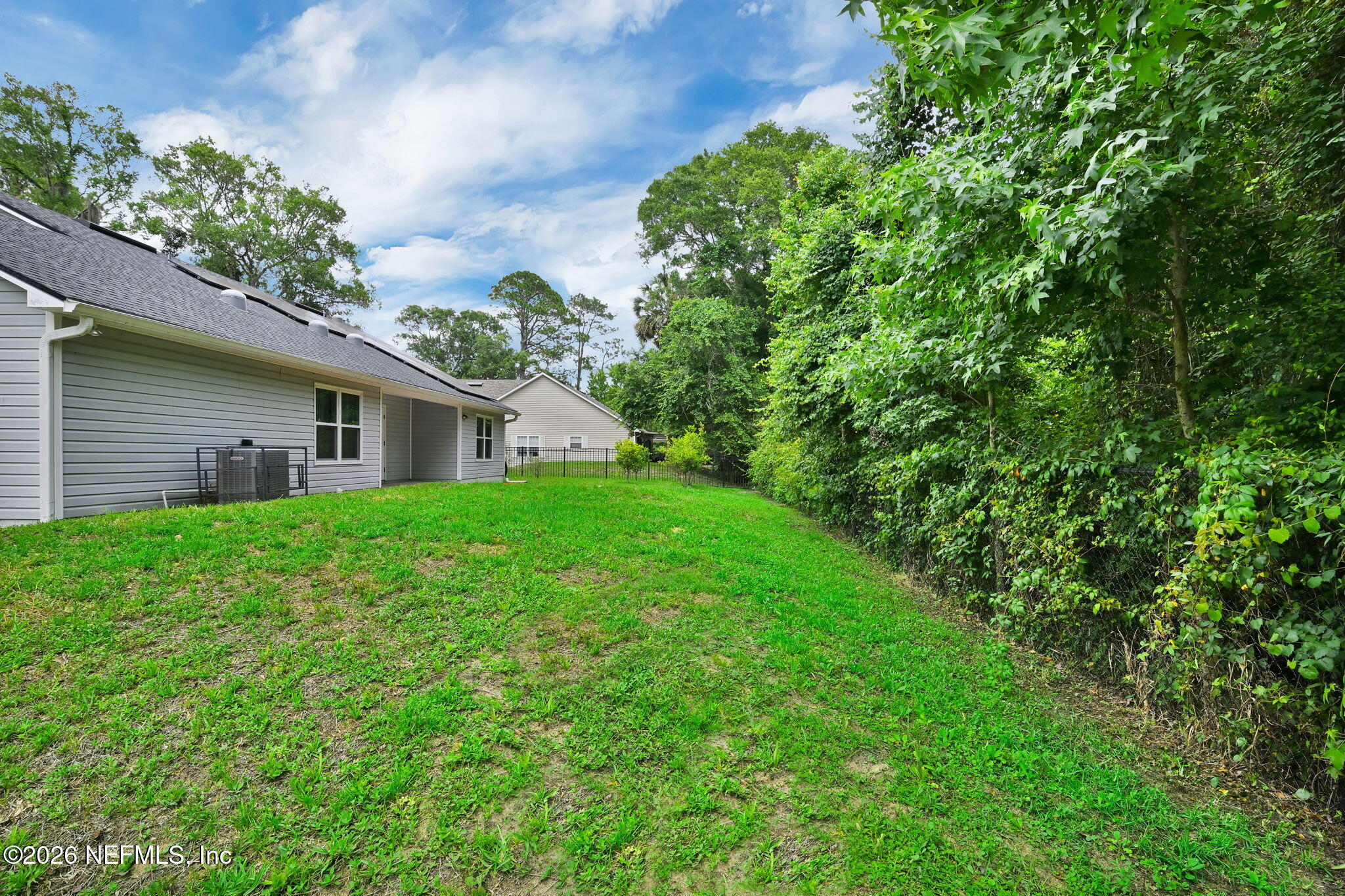 1110 Woodlawn Road, Unit D St. Augustine, FL 32084 - Photo 37 of 40 a house view with a garden space