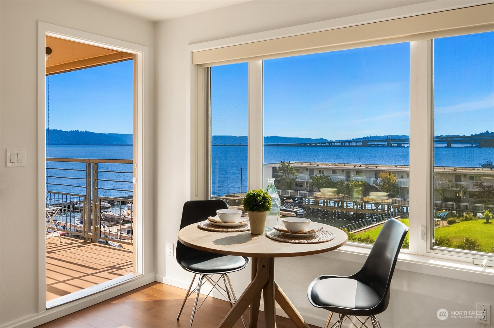 334 Lakeside Avenue South, Unit 401 Seattle, WA 98144 - Photo 2 of 24 a view of a dining room with furniture window and outside view