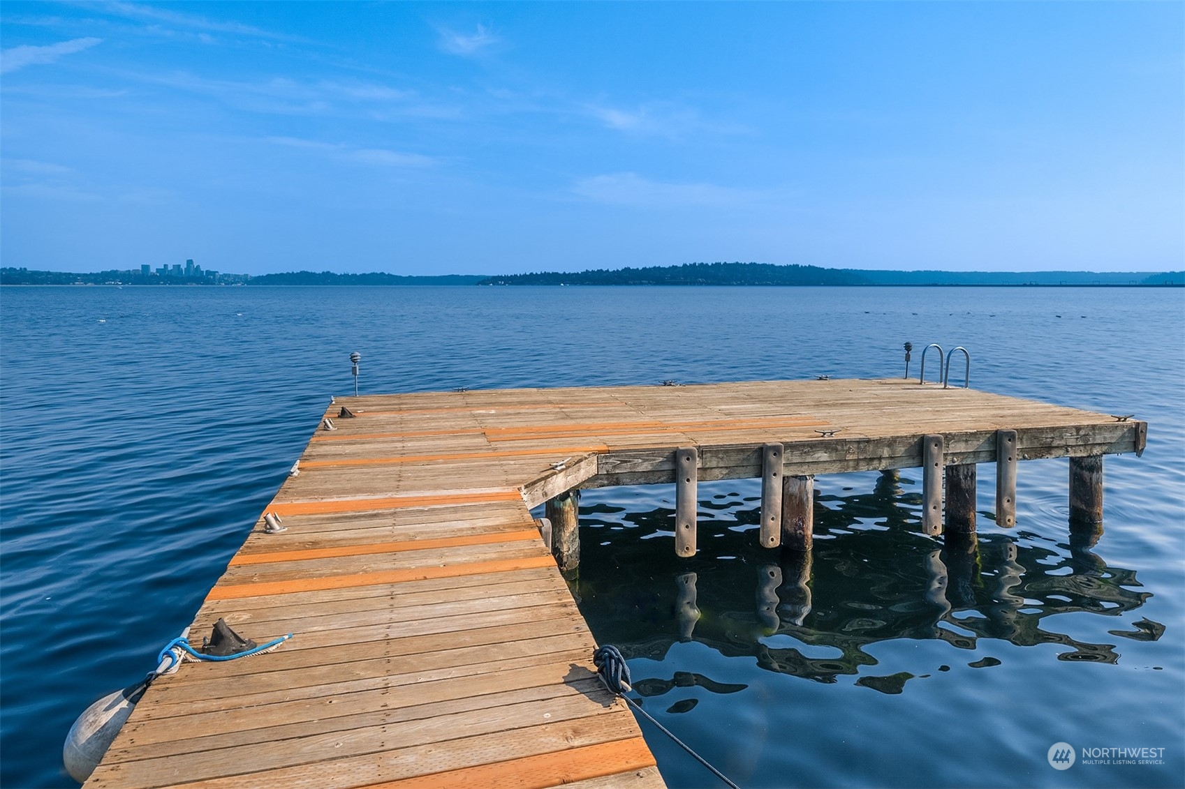 334 Lakeside Avenue South, Unit 401 Seattle, WA 98144 - Photo 22 of 24 a view of a terrace with wooden floor and lake view