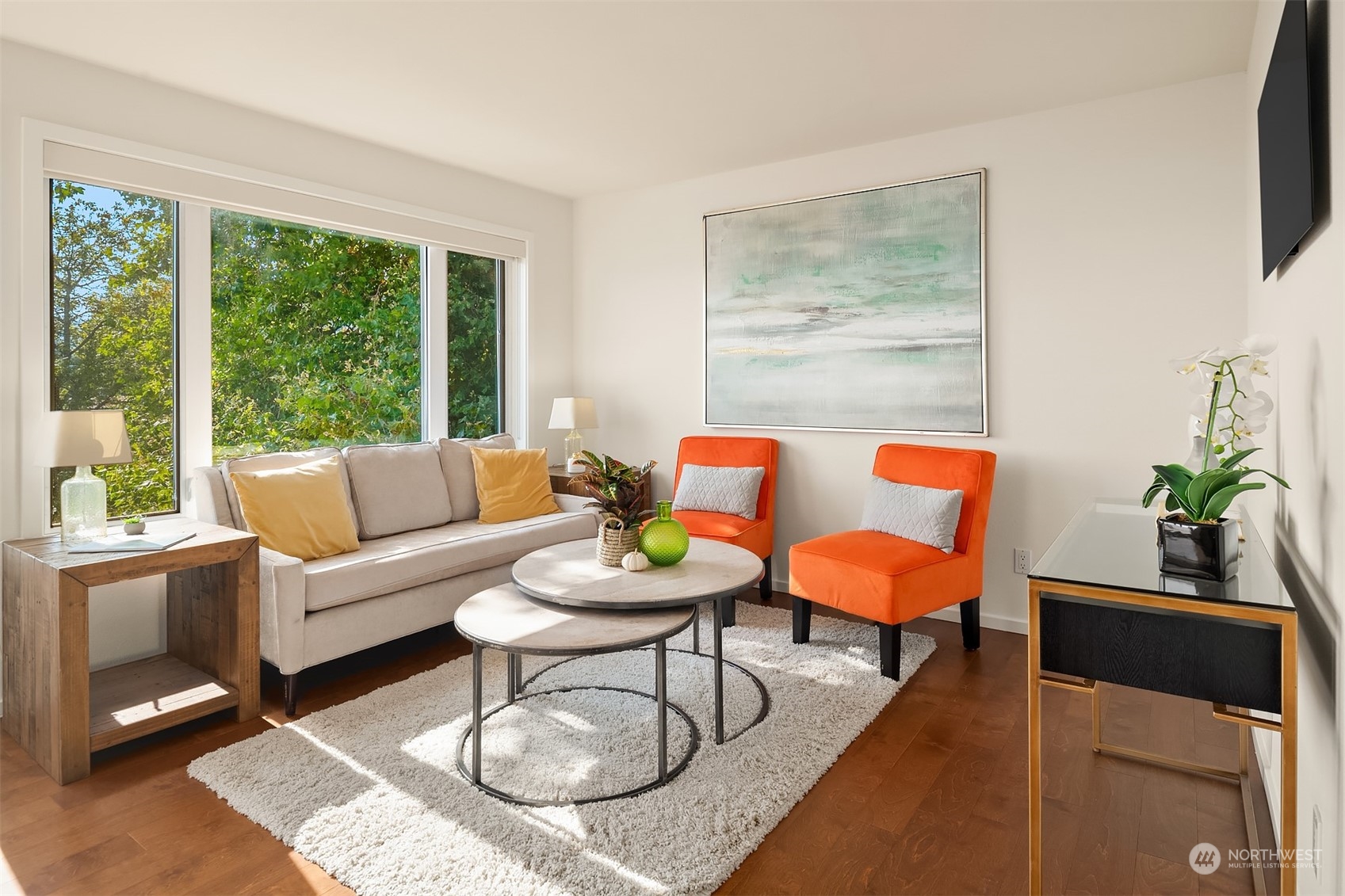 334 Lakeside Avenue South, Unit 401 Seattle, WA 98144 - Photo 6 of 24 a living room with furniture and a large window