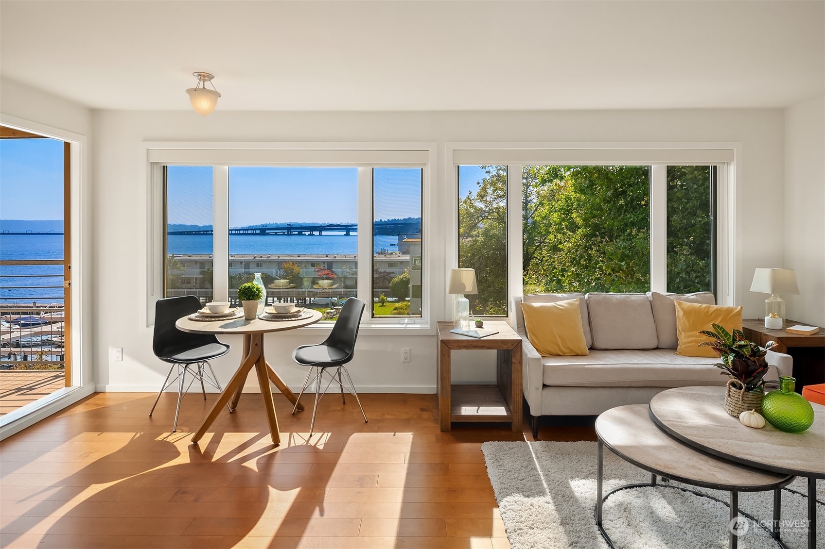 334 Lakeside Avenue South, Unit 401 Seattle, WA 98144 - Photo 8 of 24 a living room with furniture and a large window