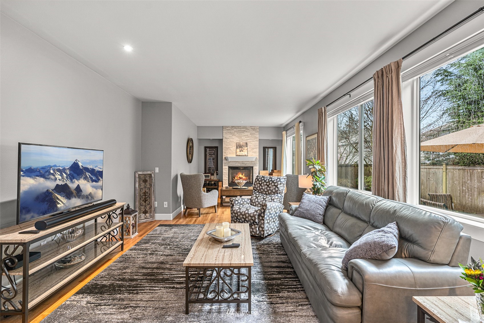 22404 5th Place West Bothell, WA 98021 - Photo 21 of 40 a living room with furniture a rug and a floor to ceiling window