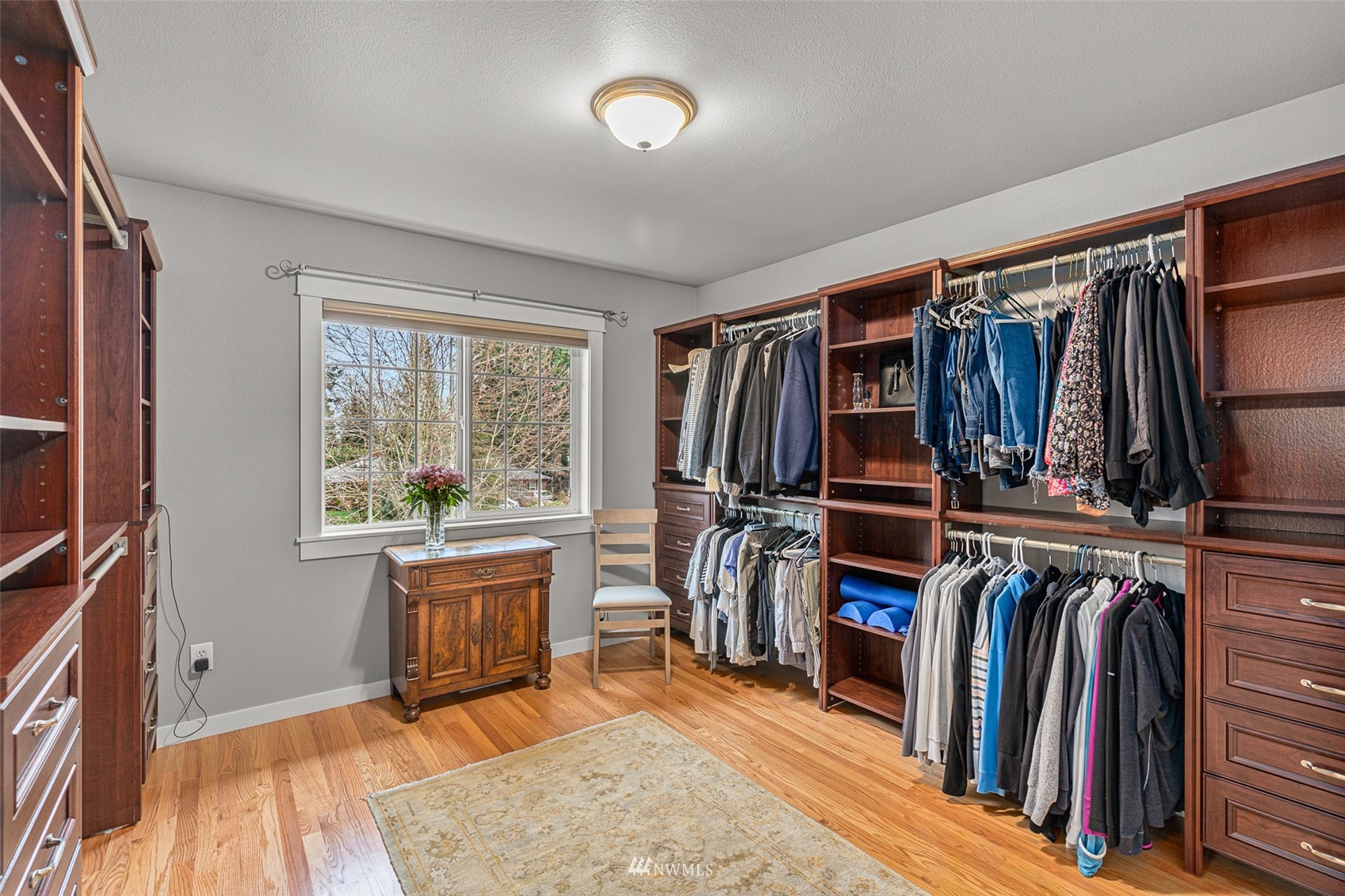 22404 5th Place West Bothell, WA 98021 - Photo 30 of 40 a view of walk in closet with clothes and shoes