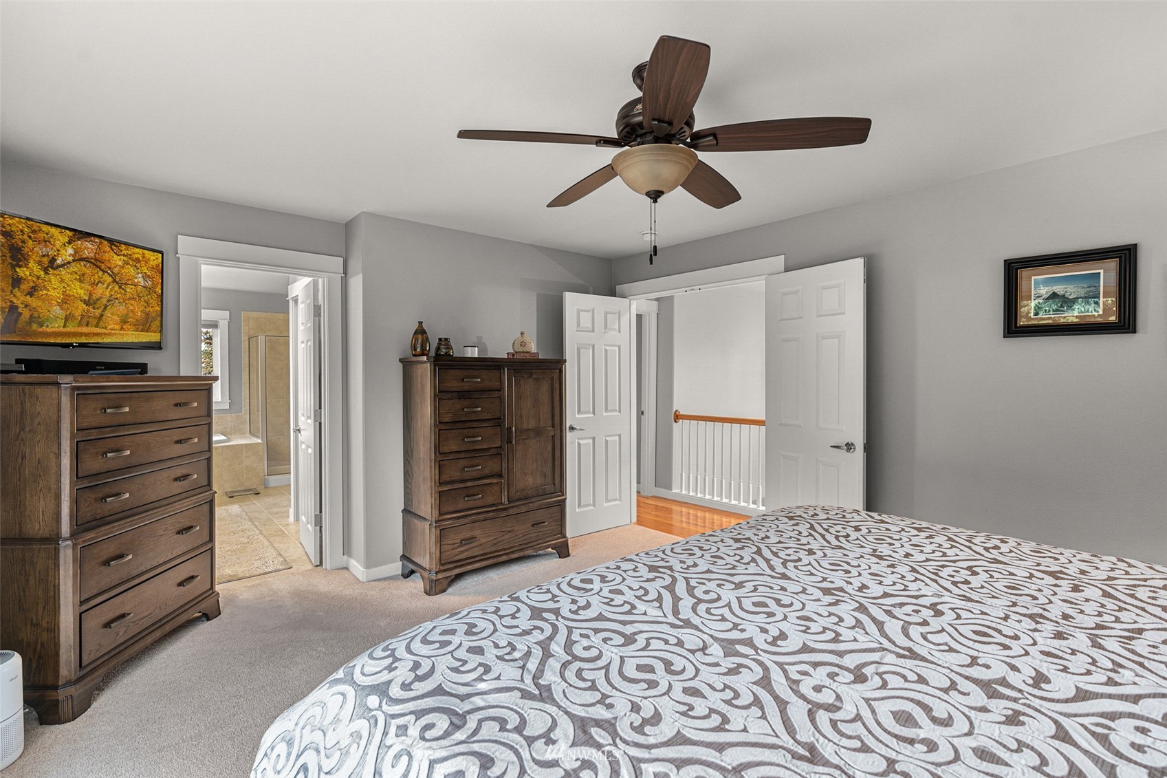 22404 5th Place West Bothell, WA 98021 - Photo 33 of 40 a bedroom with a bed and a flat screen tv