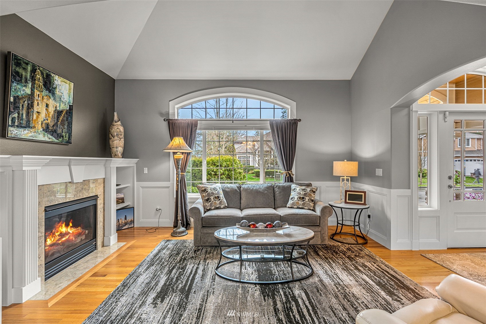 22404 5th Place West Bothell, WA 98021 - Photo 6 of 40 a living room with furniture a window and a fireplace