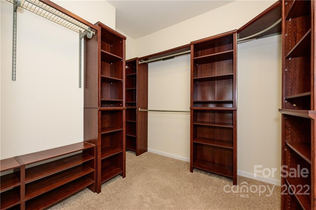 4241 Perth Road Indian Land, SC 29707 - Photo 23 of 34 a view of walk in closet with empty racks