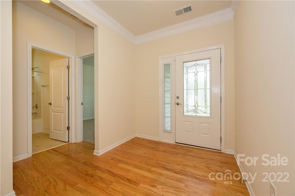 4241 Perth Road Indian Land, SC 29707 - Photo 3 of 34 a bedroom with a bed and a window