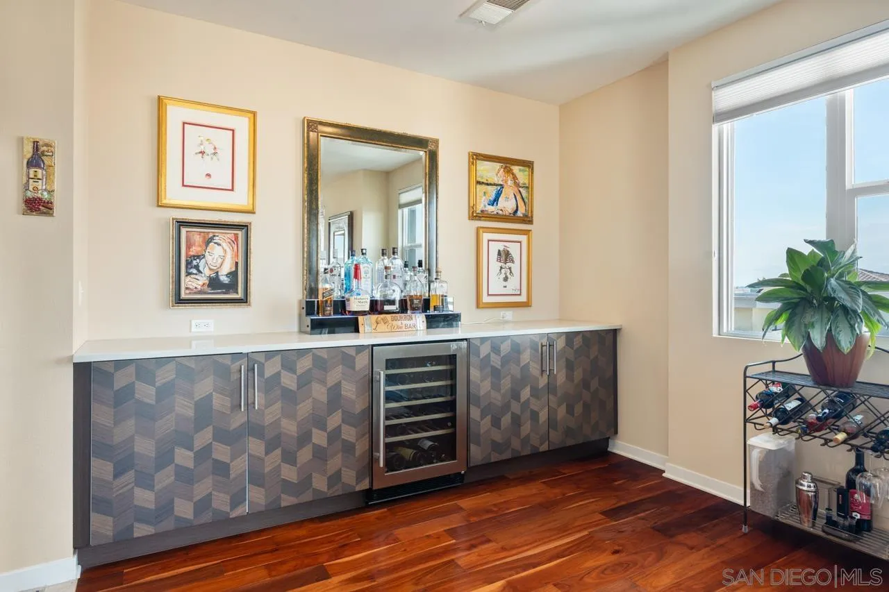 3650 Fifth Avenue, Unit 614 San Diego, CA 92103 - Photo 15 of 62 a living room with furniture and a window