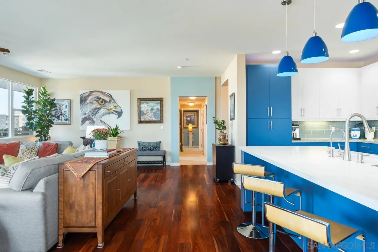 3650 Fifth Avenue, Unit 614 San Diego, CA 92103 - Photo 20 of 62 a living room with furniture a wooden floor and a sink