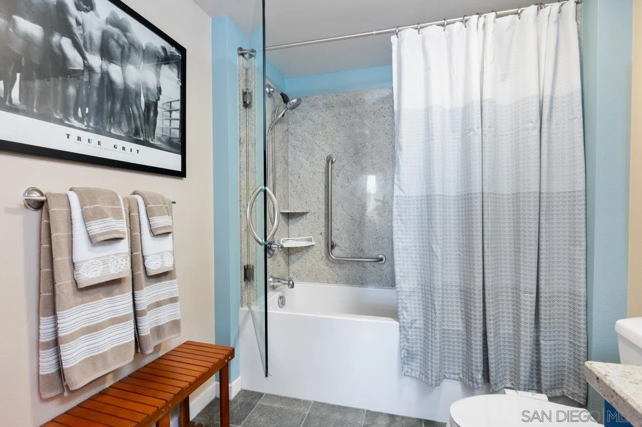 3650 Fifth Avenue, Unit 614 San Diego, CA 92103 - Photo 47 of 62 a bathroom with a shower and a toilet