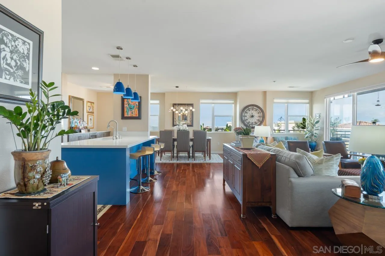 3650 Fifth Avenue, Unit 614 San Diego, CA 92103 - Photo 7 of 62 a living room with furniture and a wooden floor