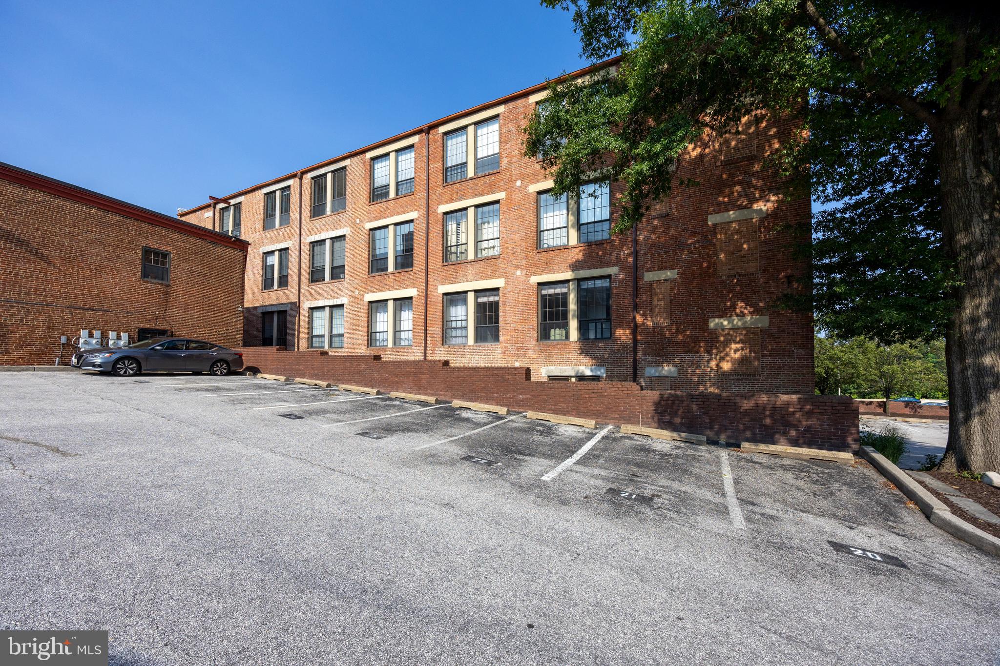 1011 Hunter Street, Unit F4 Baltimore, MD 21202 - Photo 17 of 19 a front view of a building with street view