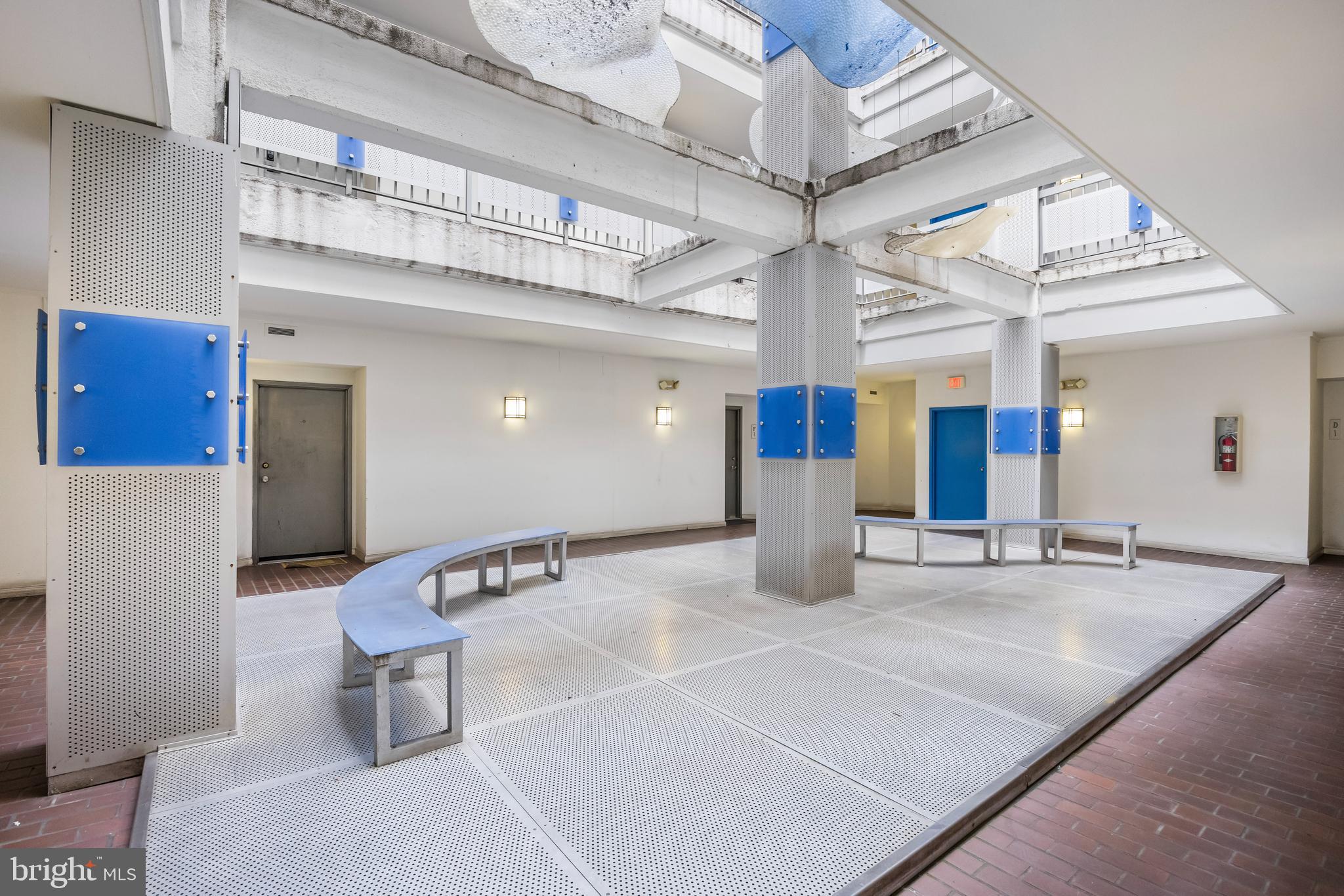 1011 Hunter Street, Unit F4 Baltimore, MD 21202 - Photo 18 of 19 a lobby with furniture and mirror