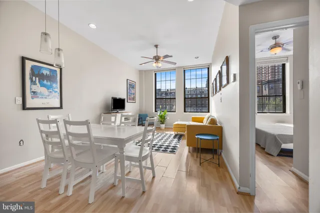 a view of a livingroom with furniture and window