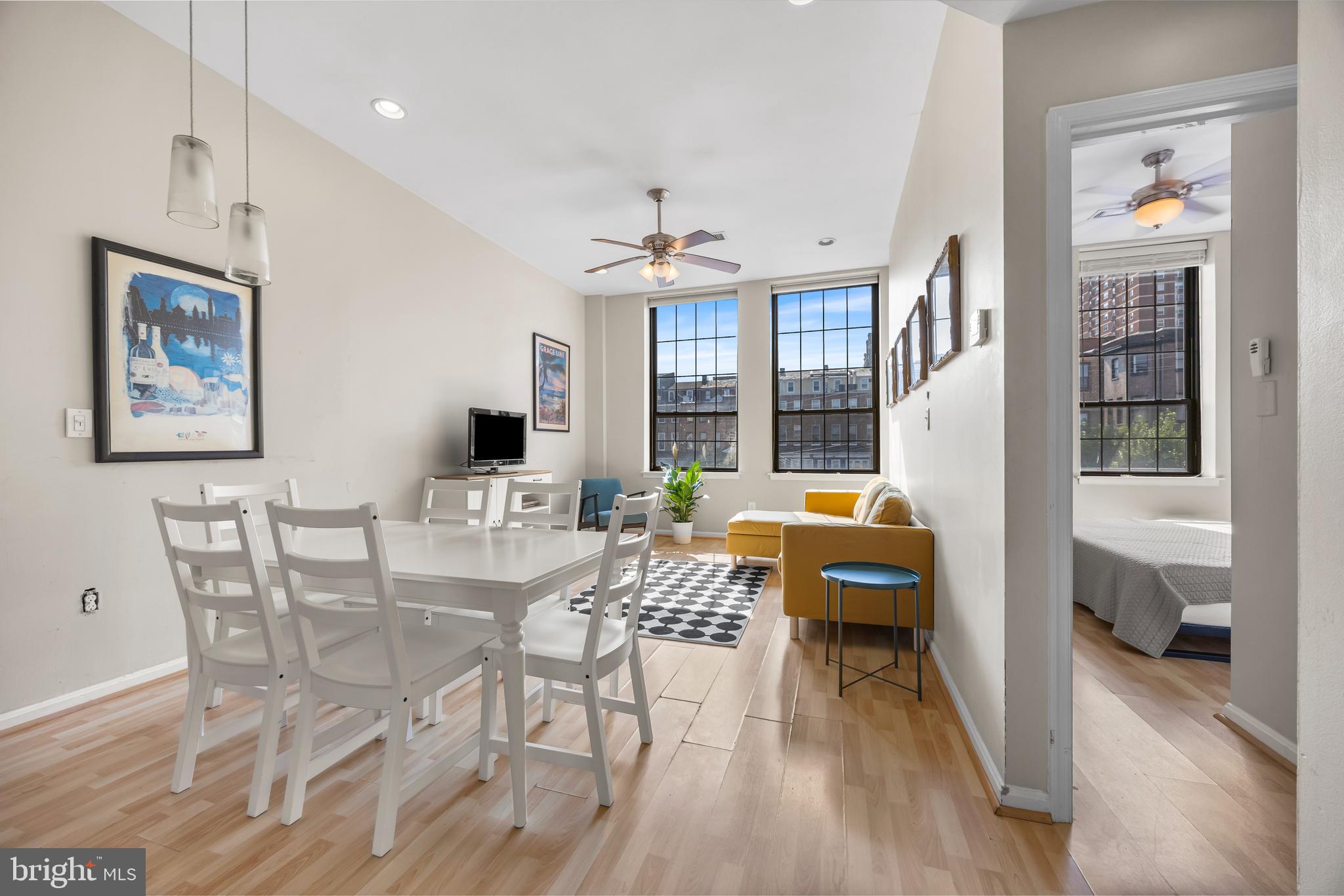 1011 Hunter Street, Unit F4 Baltimore, MD 21202 - Photo 6 of 19 a view of a livingroom with furniture and window