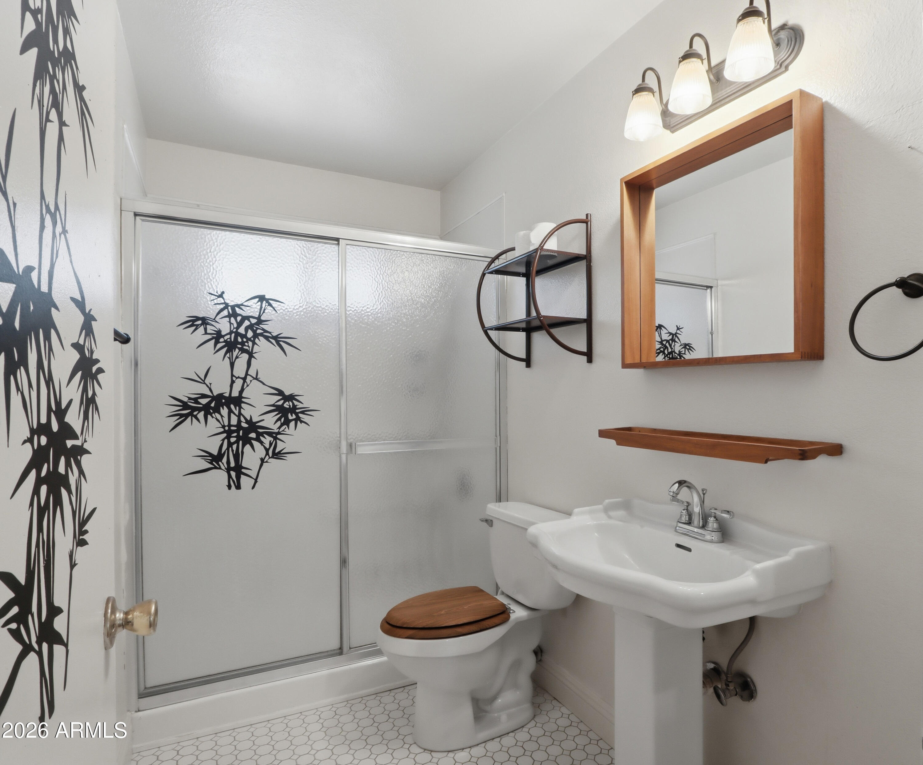 450 Cascada Road Litchfield Park, AZ 85340 - Photo 23 of 40 a bathroom with a sink toilet and mirror