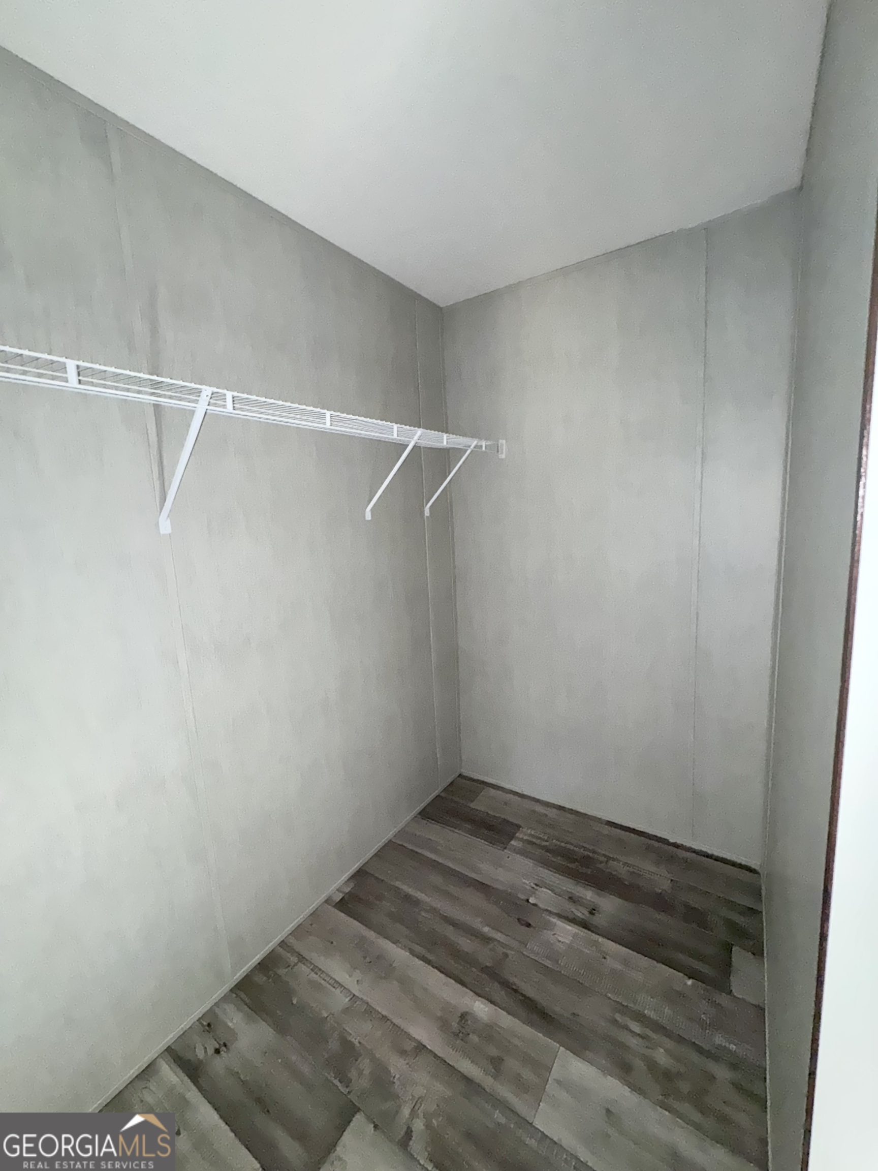 420 Mosley Bridge Road Claxton, GA 30417 - Photo 11 of 23 a view of a room with racks on the wall