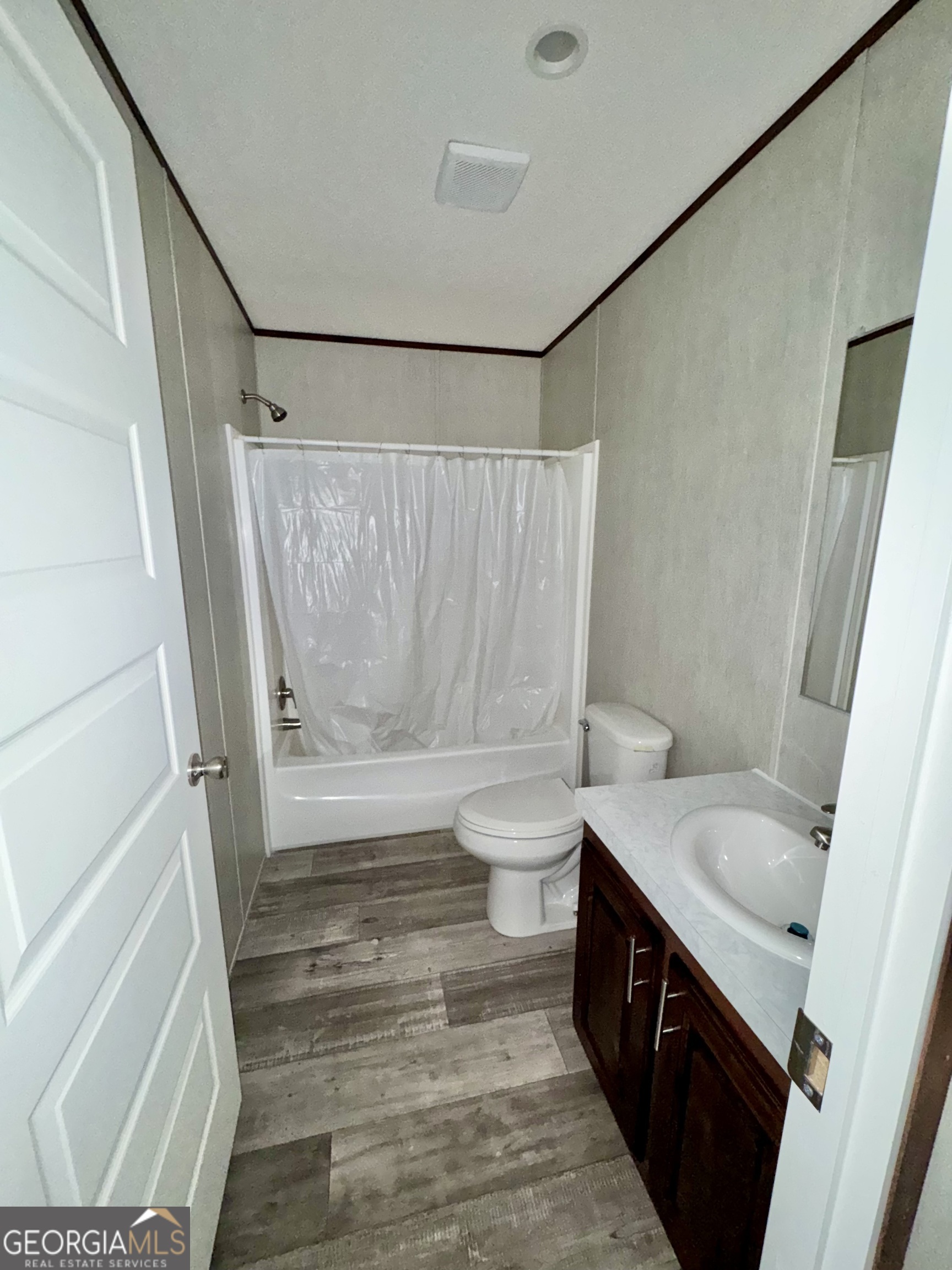 420 Mosley Bridge Road Claxton, GA 30417 - Photo 17 of 23 a bathroom with a sink a toilet and shower