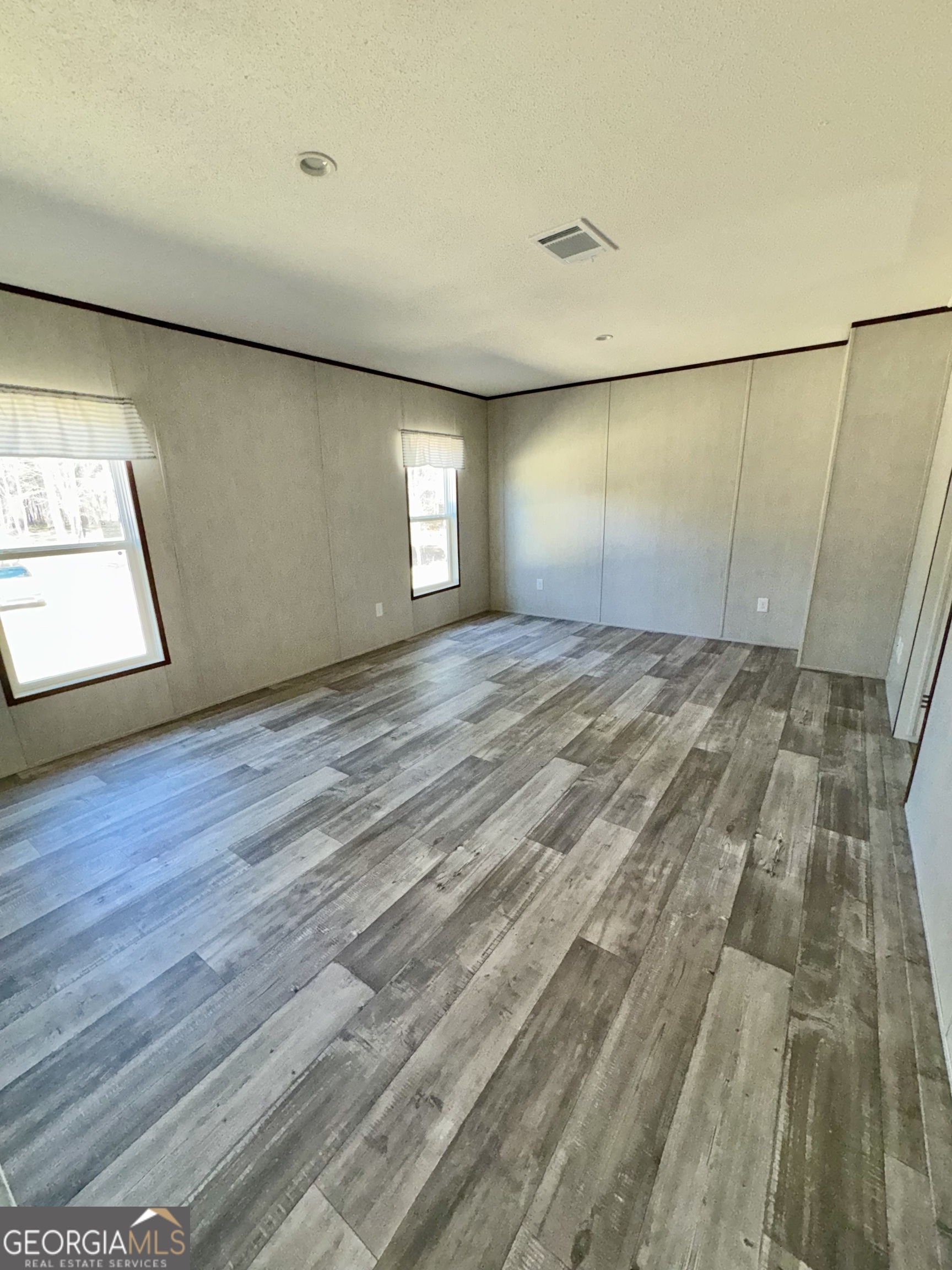 420 Mosley Bridge Road Claxton, GA 30417 - Photo 7 of 23 a view of an empty room and window