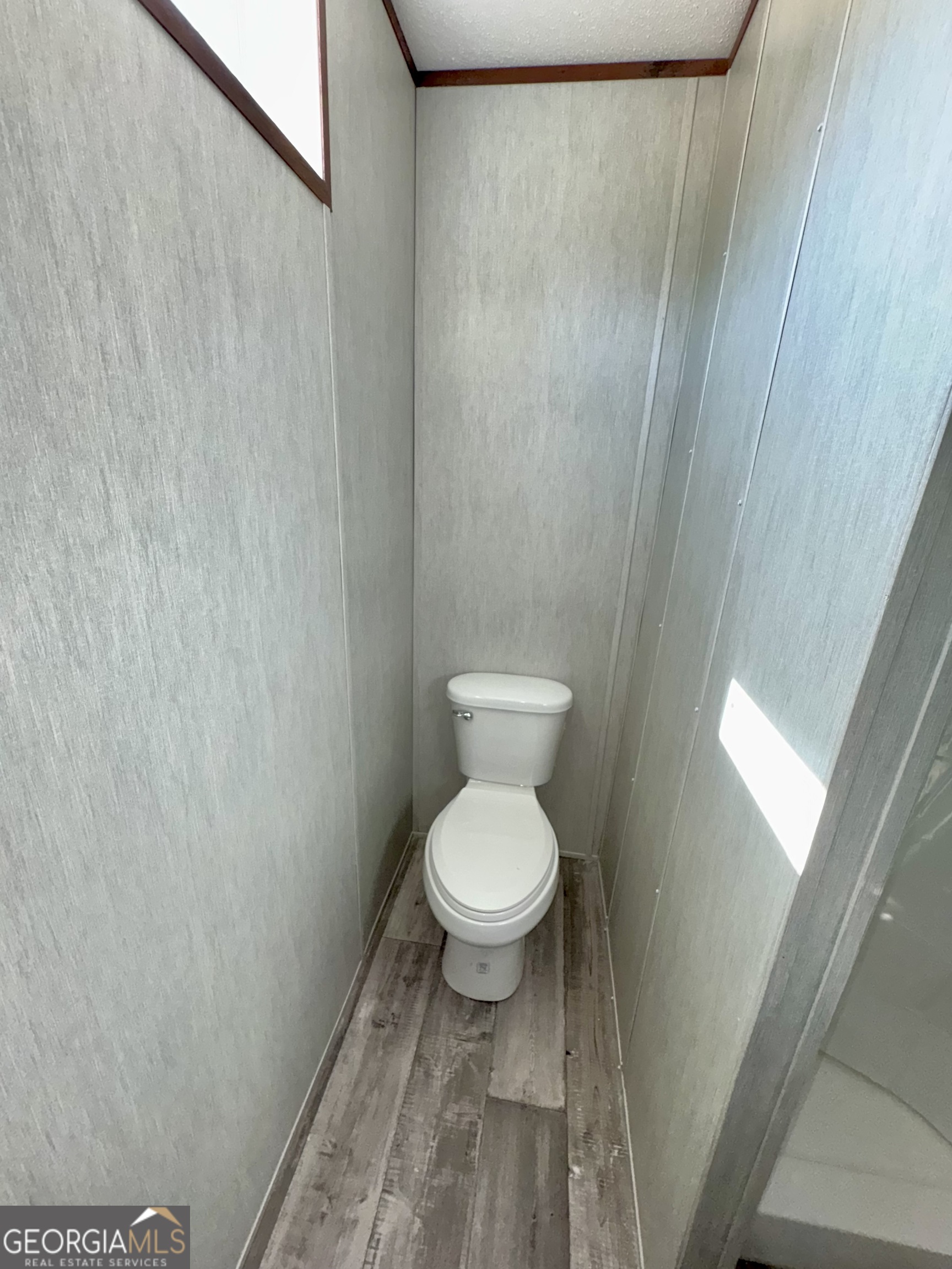 420 Mosley Bridge Road Claxton, GA 30417 - Photo 10 of 23 a bathroom with a toilet