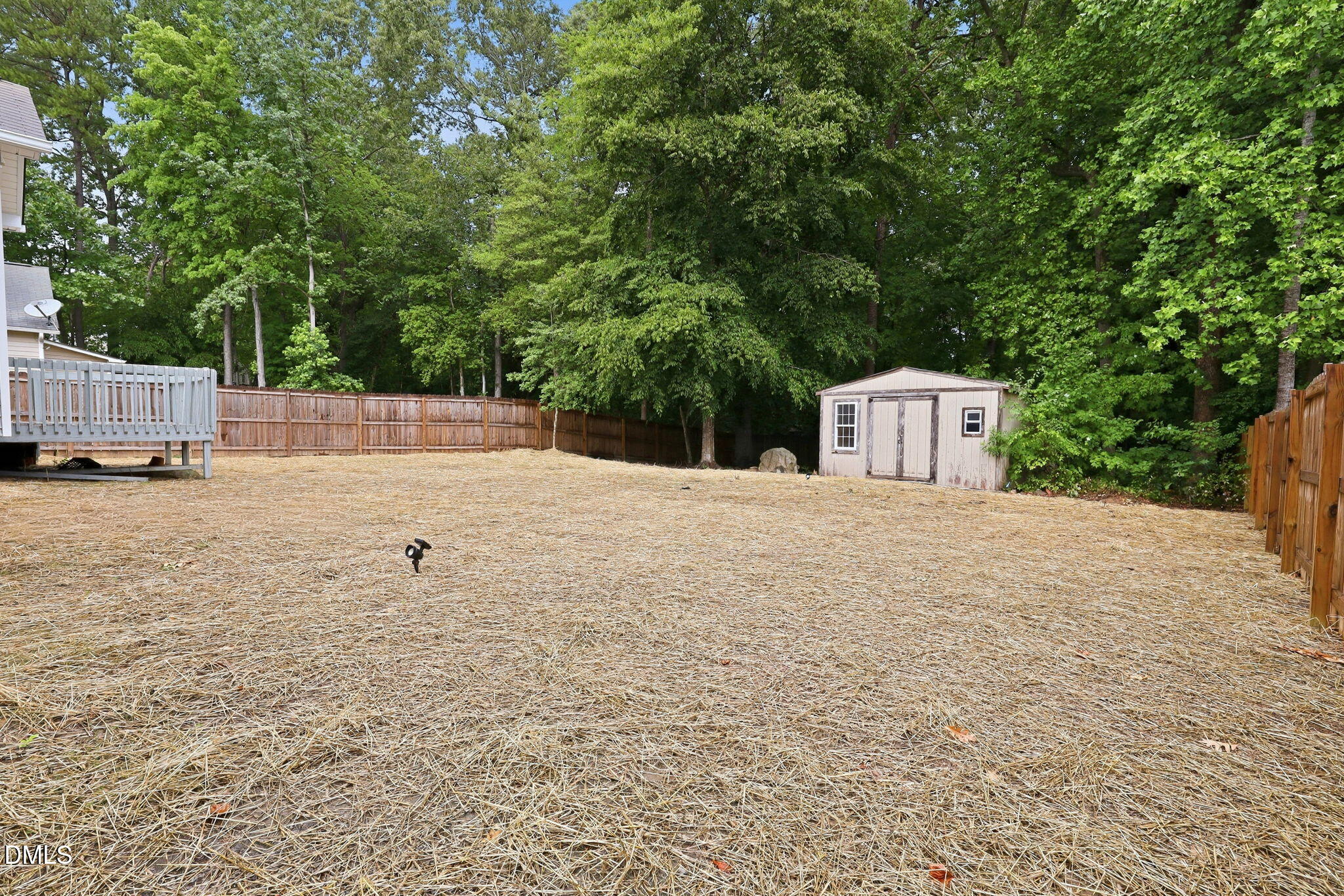 1005 Kavkaz Street Raleigh, NC 27610 - Photo 33 of 40 Fenced Backyard with Storage Shed