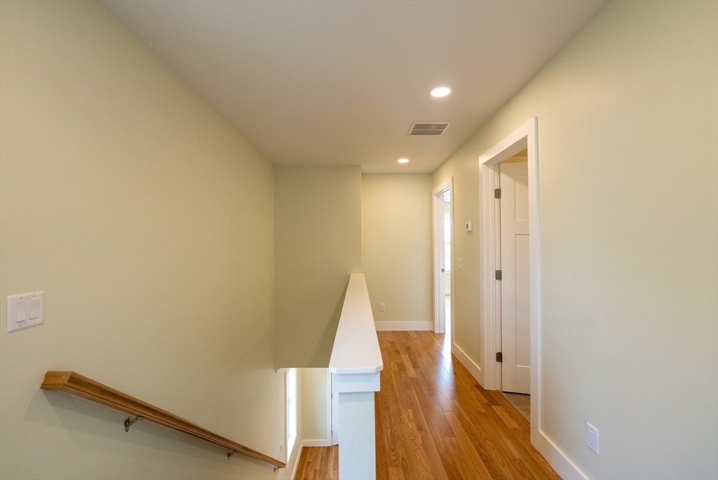 159 State Street New Bedford, MA 02740 - Photo 14 of 30 a view of a room with wooden floor and entryway