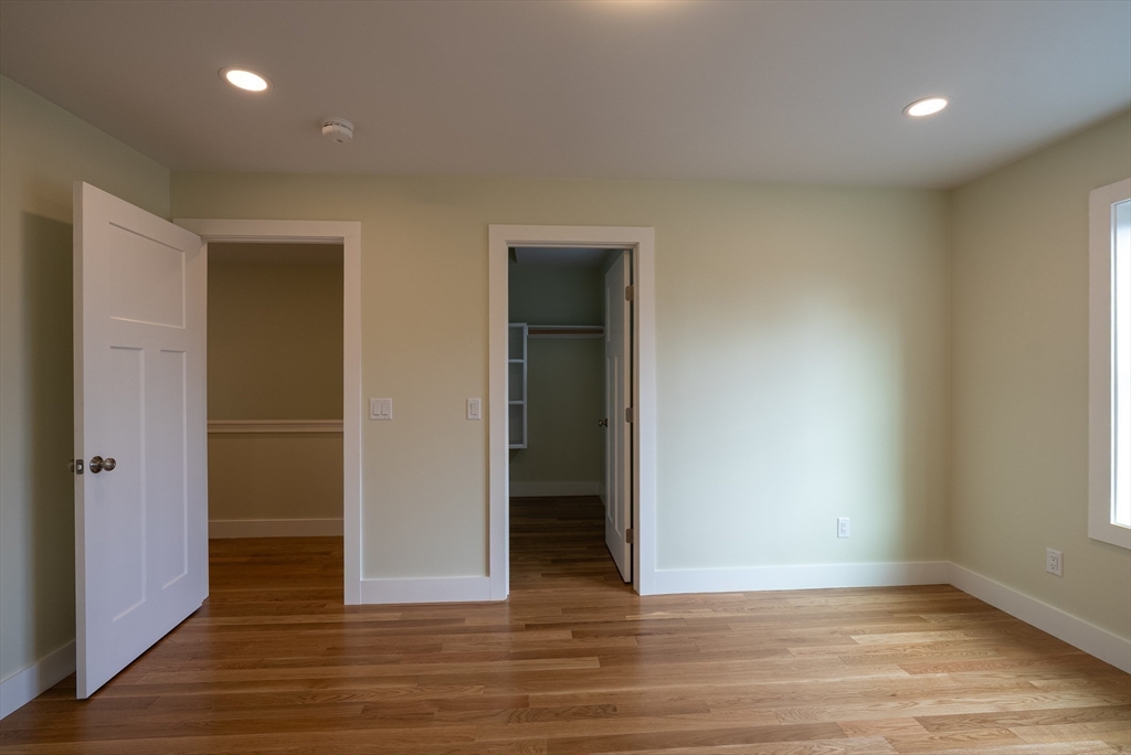 159 State Street New Bedford, MA 02740 - Photo 26 of 30 an empty room with wooden floor and closet