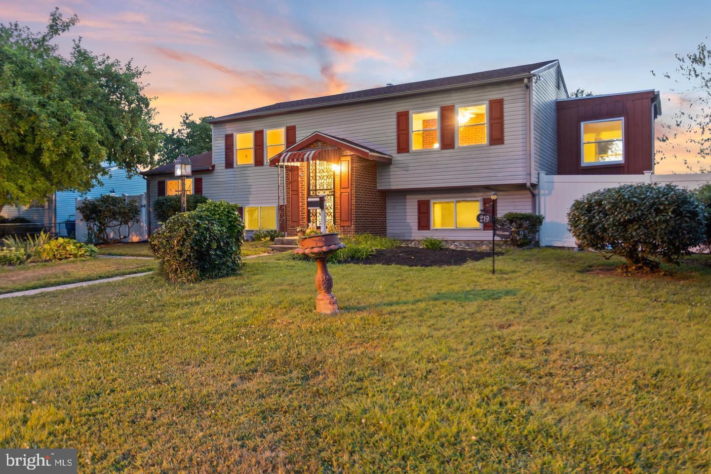 219 Harvard Avenue Pemberton, NJ 08068 - Photo 2 of 42 a house view with a swimming pool