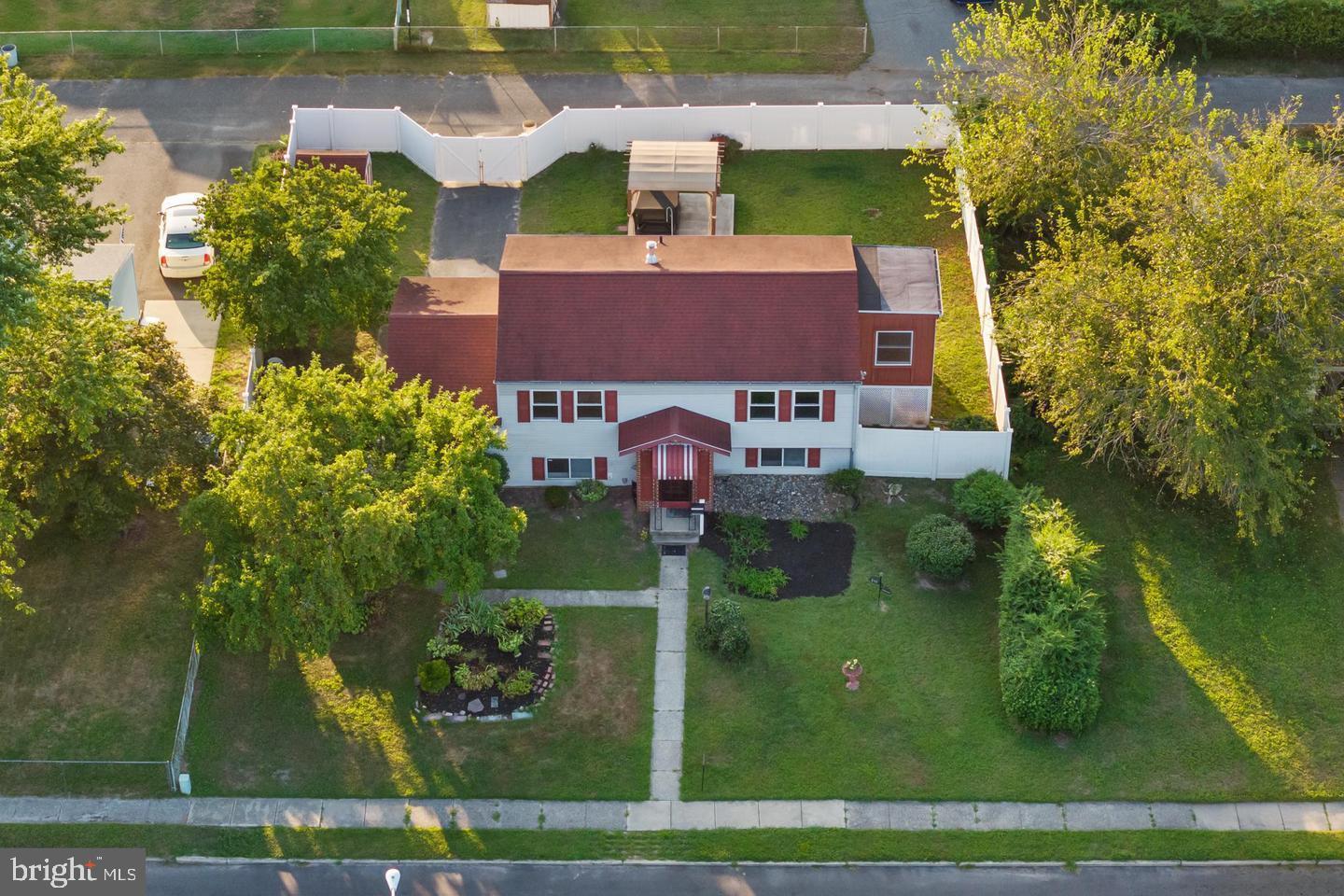 219 Harvard Avenue Pemberton, NJ 08068 - Photo 25 of 42 front view of a house with a yard