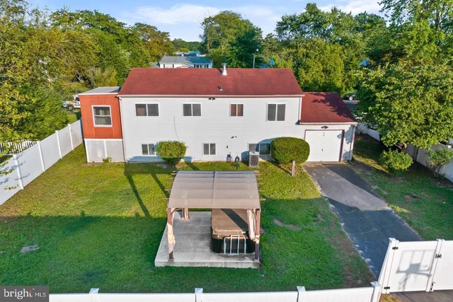 a aerial view of a house with swimming pool