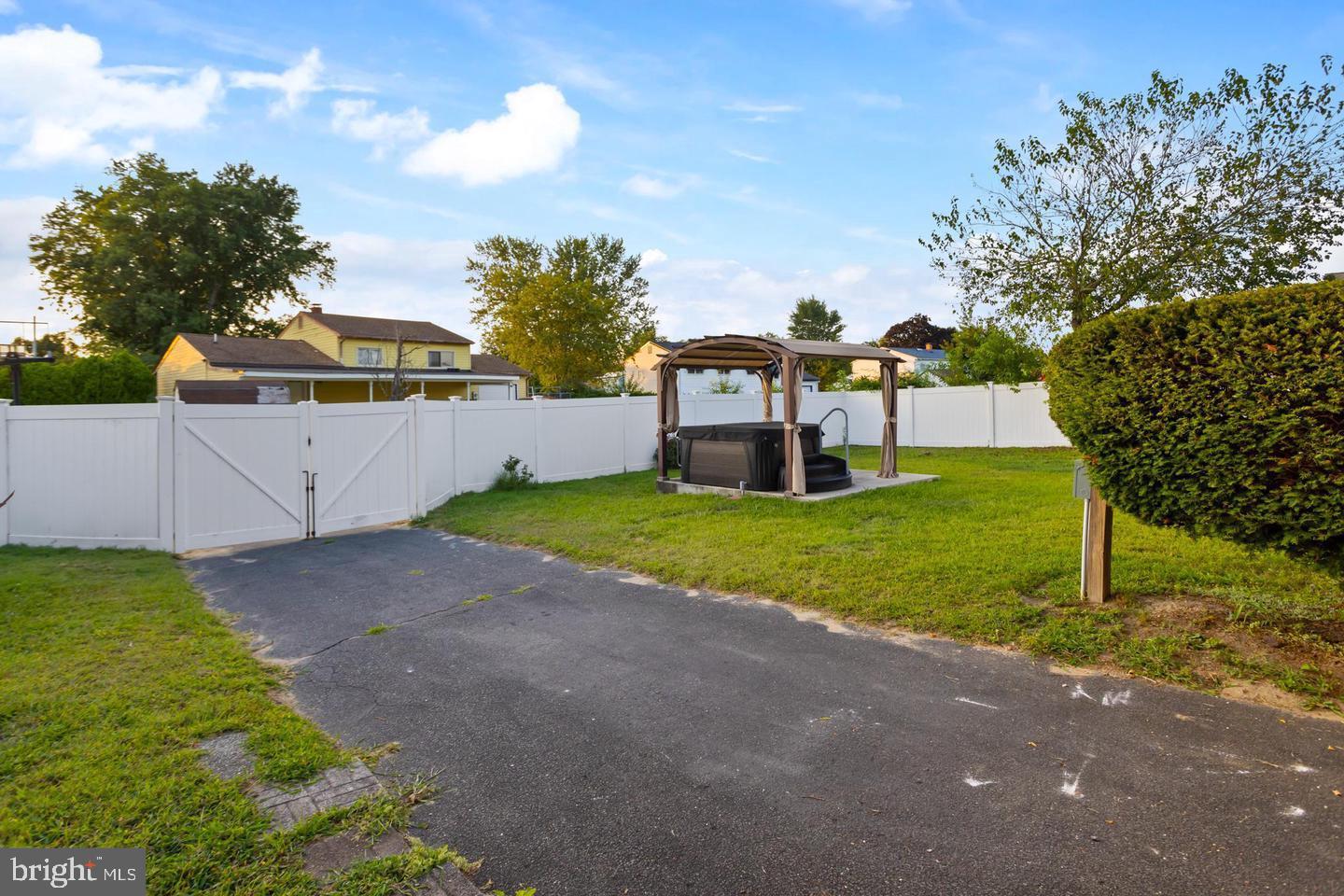 219 Harvard Avenue Pemberton, NJ 08068 - Photo 30 of 42 a view of a house with pool and yard