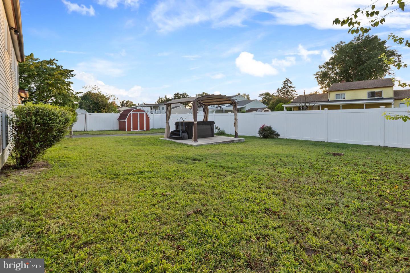 219 Harvard Avenue Pemberton, NJ 08068 - Photo 31 of 42 a view of a house with a big yard and large trees