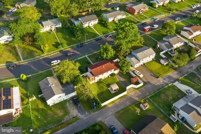 an aerial view of a pool yard patio and outdoor seating