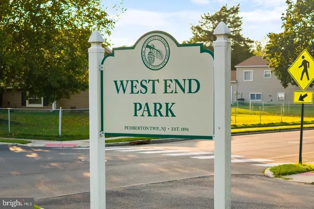 a view of outdoor space swimming pool and front door