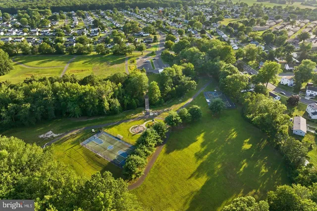 a view of a lake with a yard