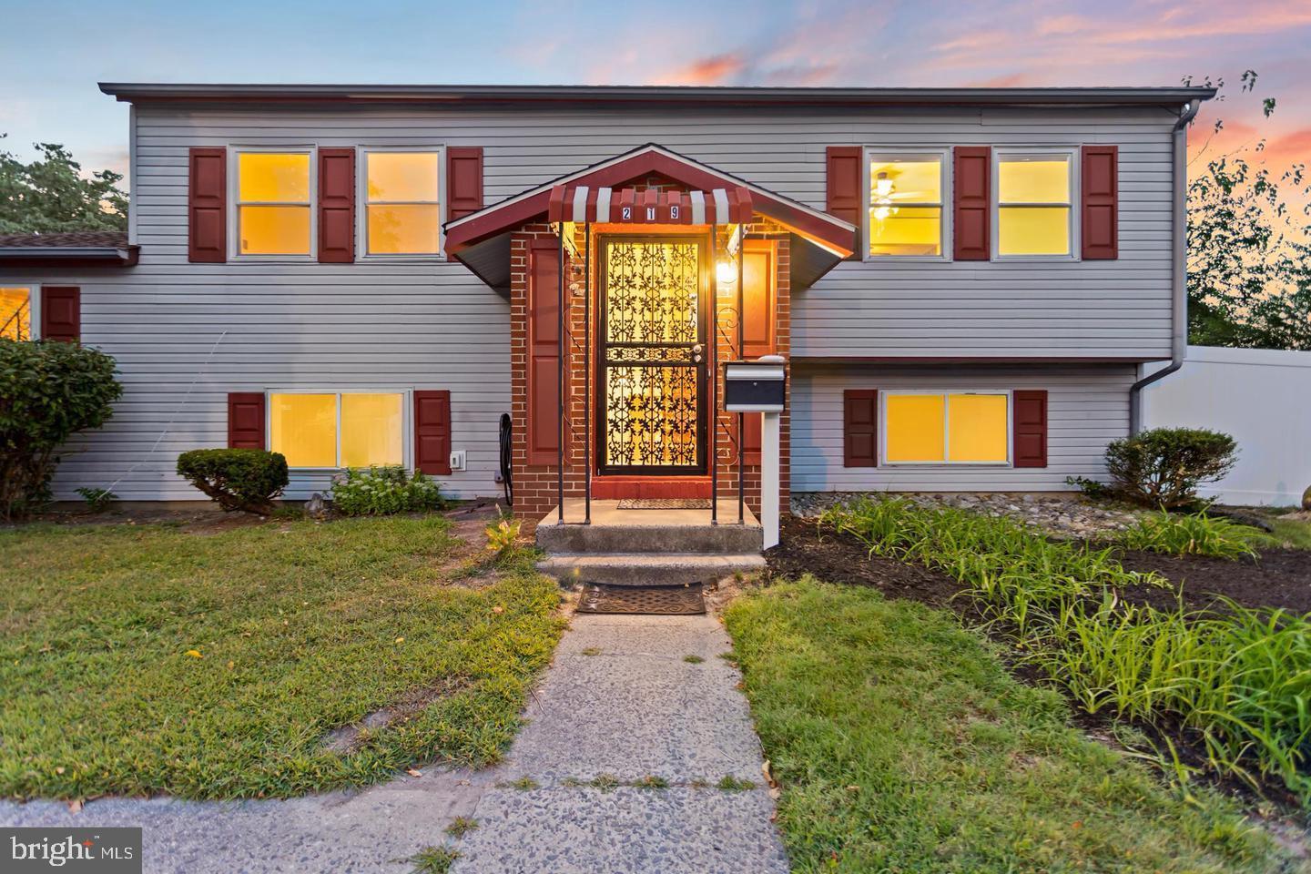 219 Harvard Avenue Pemberton, NJ 08068 - Photo 4 of 42 a front view of a house with garden