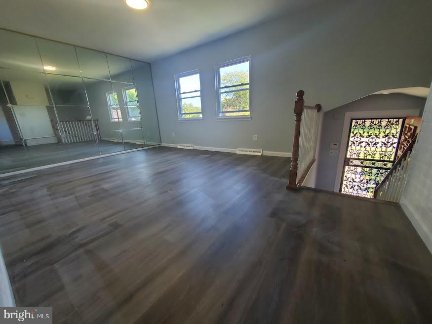 219 Harvard Avenue Pemberton, NJ 08068 - Photo 10 of 42 an empty room with wooden floor and windows
