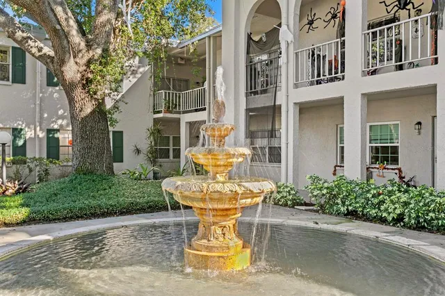 a view of a car park in front of retail shop