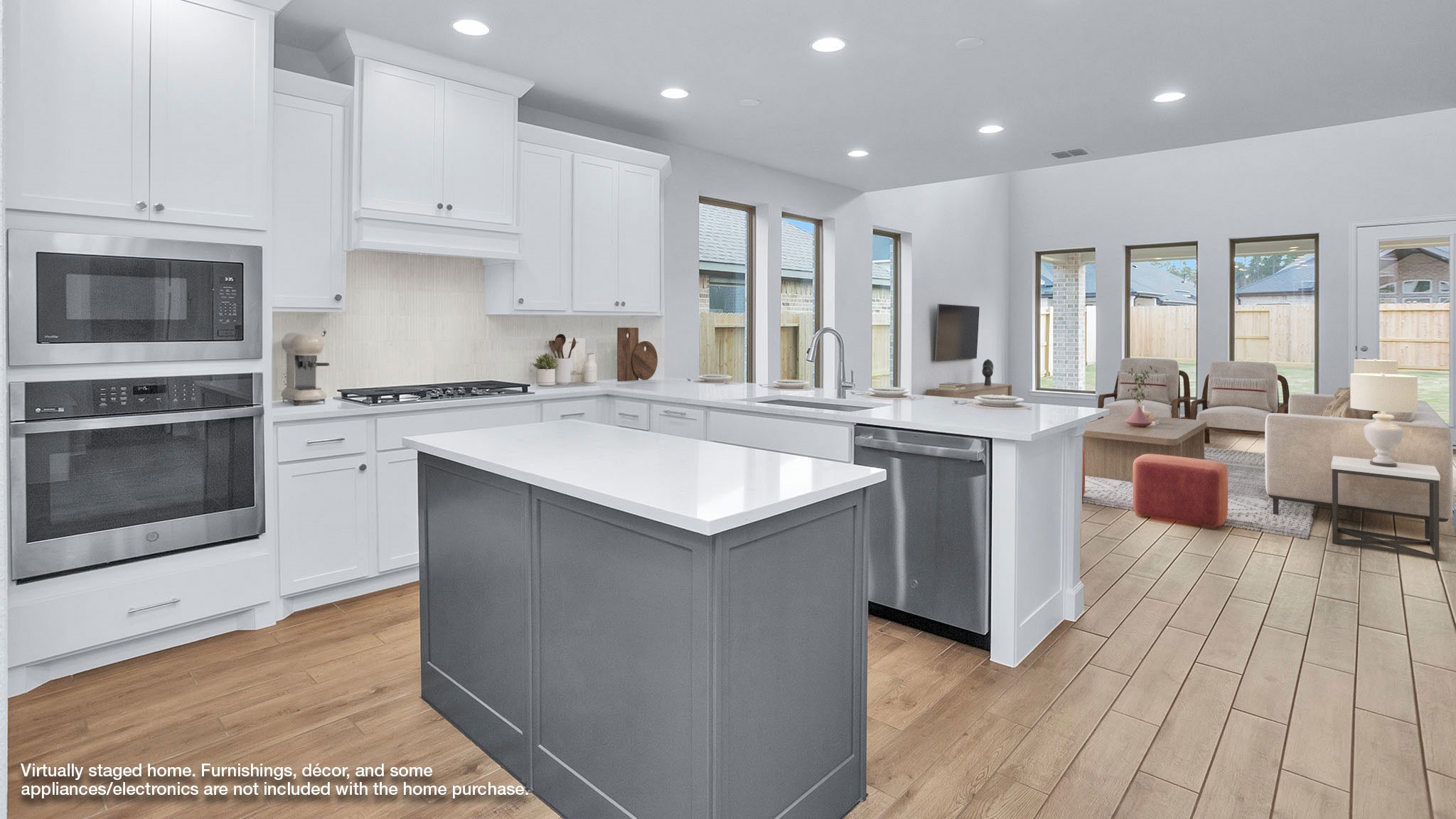 9620 Mount Brewer Lane Porter, TX 77365 - Photo 2 of 25 a kitchen with a sink stove and cabinets