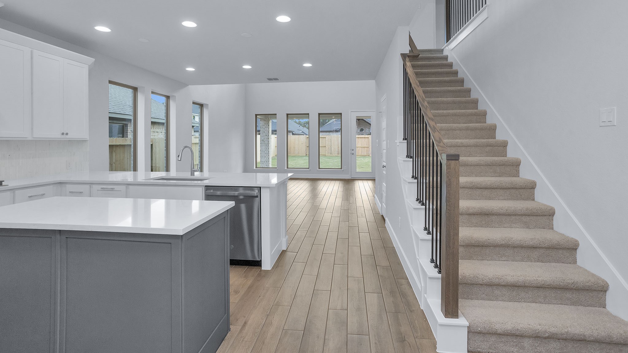 9620 Mount Brewer Lane Porter, TX 77365 - Photo 10 of 25 a view of a kitchen with granite countertop a sink and a stove