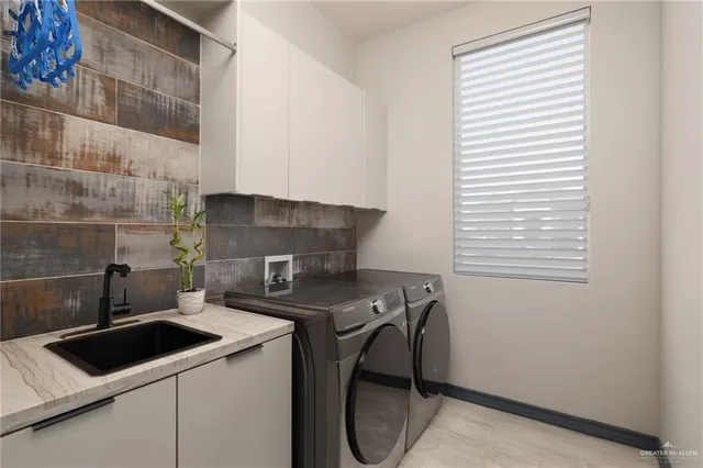 a kitchen with a stove and a sink